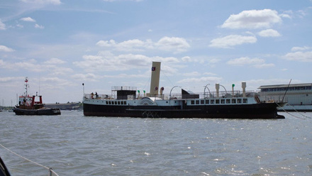 An image of the paddle driven steamship, The Medway Queen floating in the harbour.