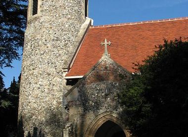 Evelyn Simak / The church of SS Gervase and Protase - tower and porch / CC BY-SA 2.0
