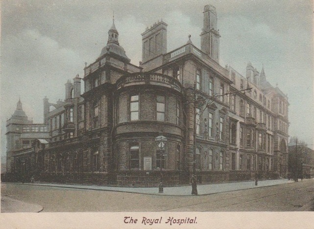  Grand building on a street corner of various heights and styles.