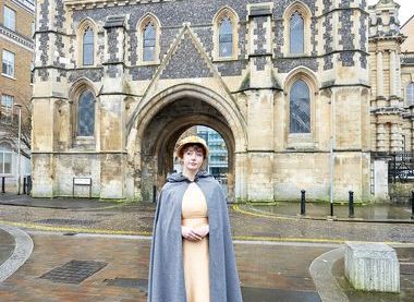 Volunteer dressed as Jane Austen outside the Abbey Gateway, image courtesy of REDA