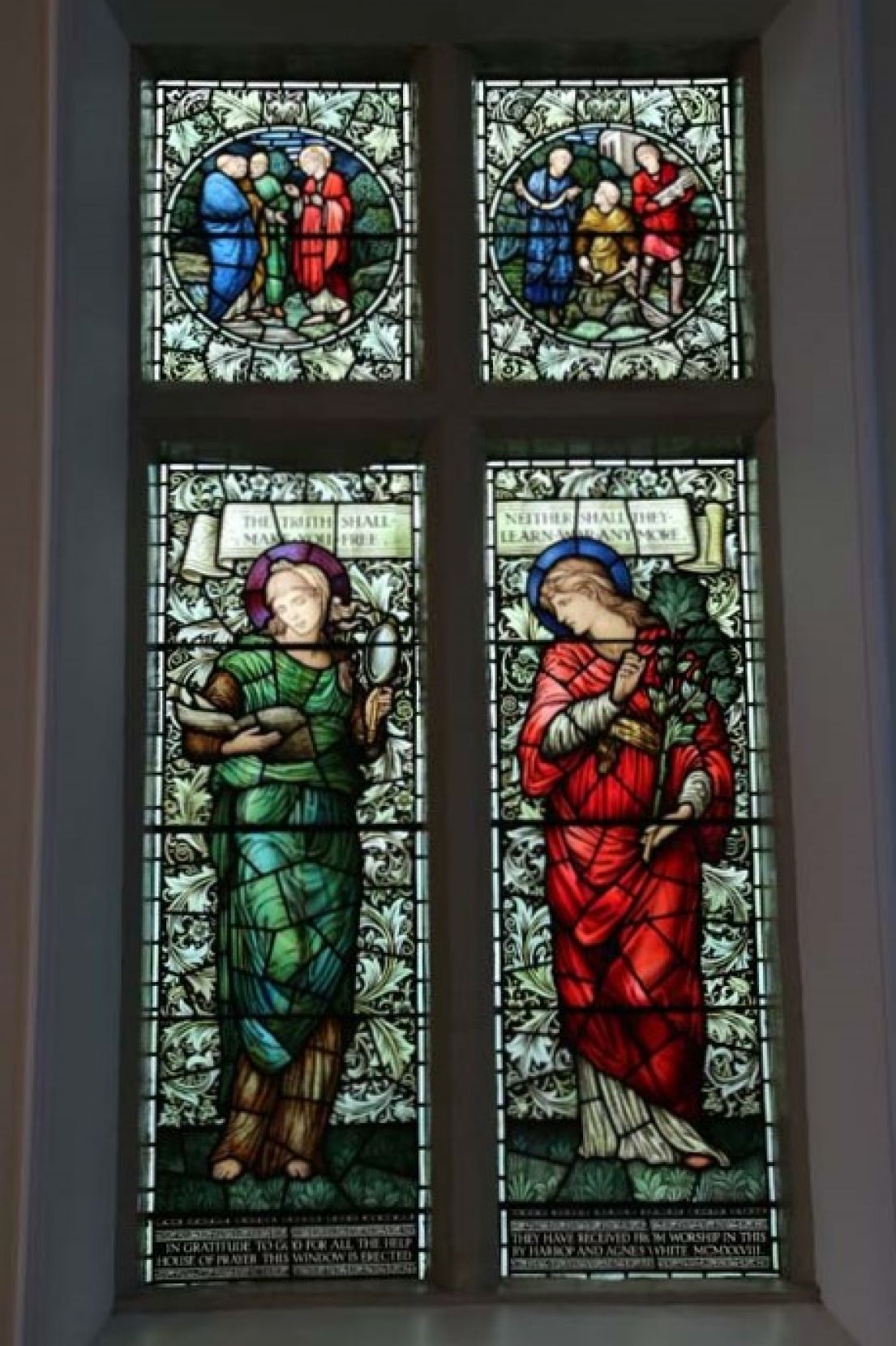 A total of four stained glass windows depicting saints. The top two images are square the bottom too are long windows.
