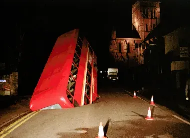 A number 26 bus in a hole in Earlham Road, the Cathedral can be seen in the background