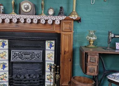 The cosy fireside area in our parlour.