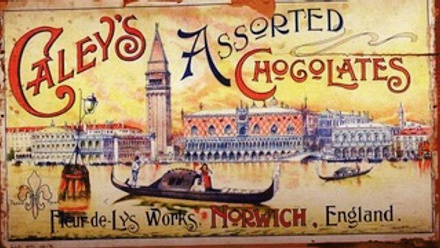 Chocolate advertising poster with an image of a gondolier on a river in front of buildings.