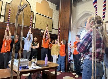 A new generation of ringers, against a backdrop of historic peal boards
