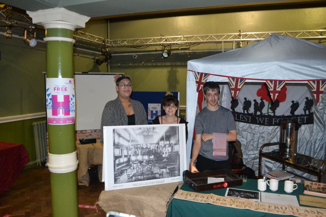 A women and two children standing by displays they have created for there Heritage Open Days events.