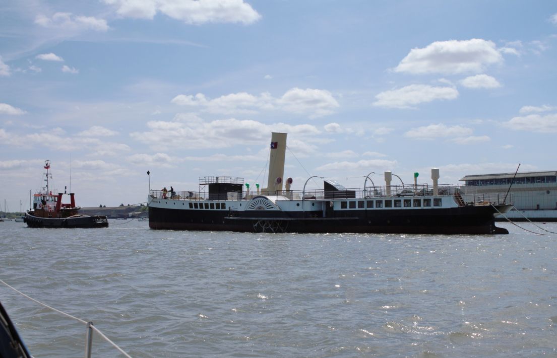 An image of the paddle driven steamship, The Medway Queen floating in the harbour.