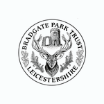 A circular black and white logo for Bradgate Park Trust featuring a stag, a stone building and leaves.