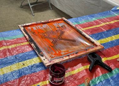 Bring your own fabric items to try screen printing.