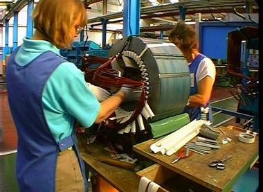 Operatives at winder machine